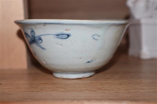 A pair of blanc de chine shi shi and blue and white bowl height 9cm